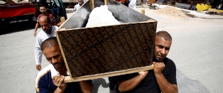 العراق : حداد وطنى على 213 قتيلاً فى تفجيري بغداد