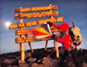 Seychelles Flag flies proudly on Mount Kilimanjaro in Tanzania