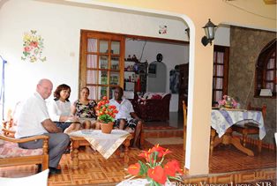 Seychellois discuss their Tourism Industry as Minister St.Ange visits small establishments