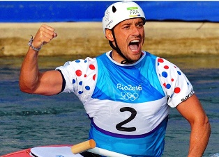 French Olympic Gold Medal winner Denis Gargaud discuss with Indian Ocean tourism personalities from Seychelles and Mauritius