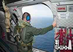 Search efforts intensified as new debris washed up