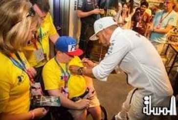 PHOTO CAPTION: JOSHUA’S FORMULA 1® WISH COMES TRUE AT YAS MARINA CIRCUIT