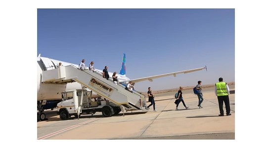 بالصور .. وصول اول رحلة طيران من بولندا إلي مطار طابا بعد توقف اربع سنوات