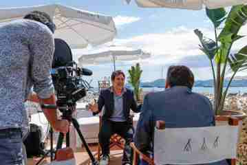 JAVIER BARDEM STOPS BY THE HFPA LOUNGE AT NIKKI BEACH CANNES